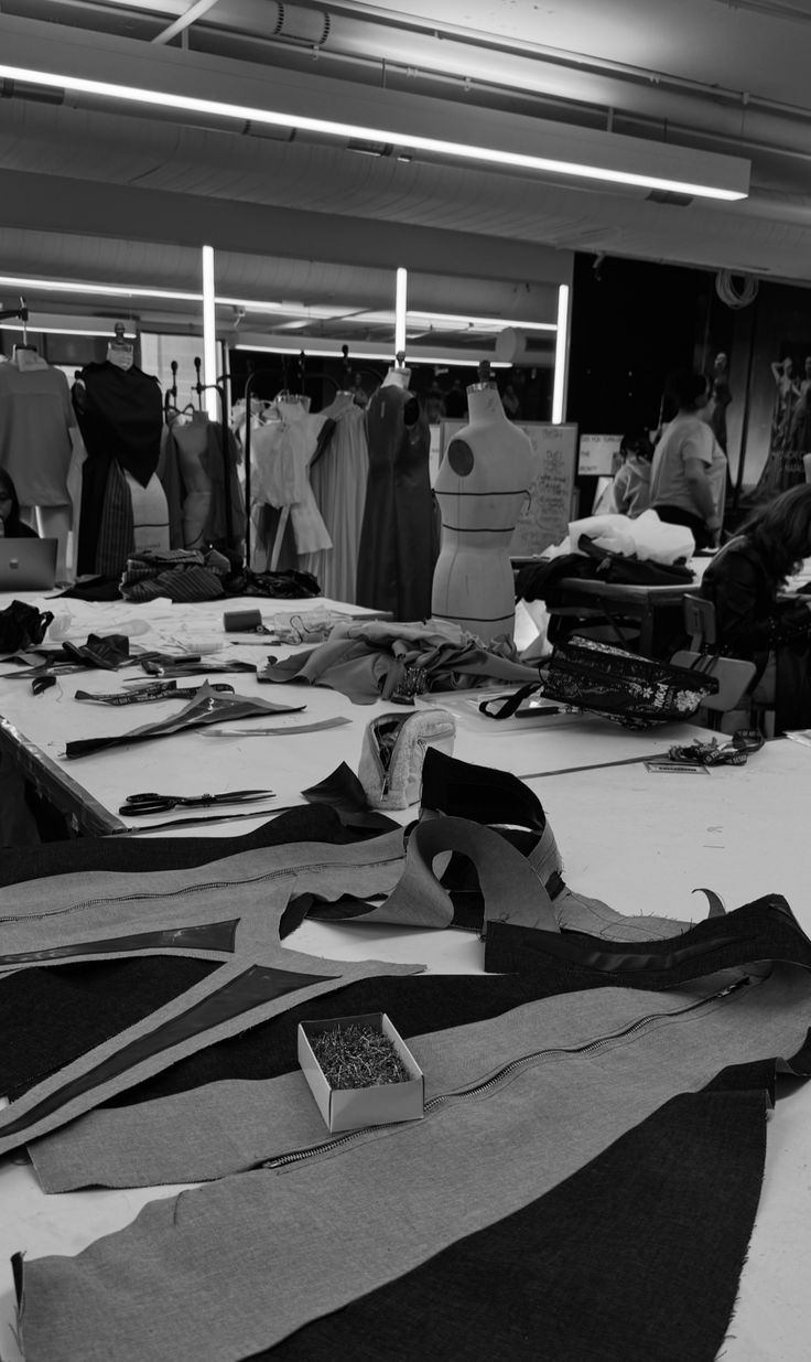 Dress forms and fabric pieces in a garment workroom